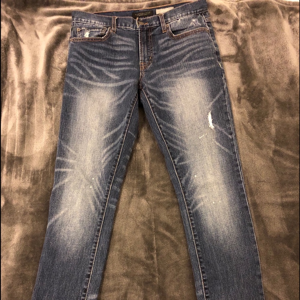 Blue jeans with minor distressing